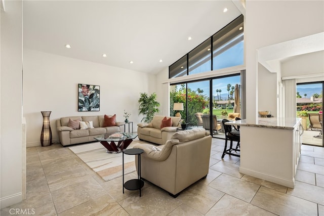 283 Wild Horse Dr, Palm Desert, CA 92211 - living area featuring recessed lighting, baseboards, and high vaulted ceiling