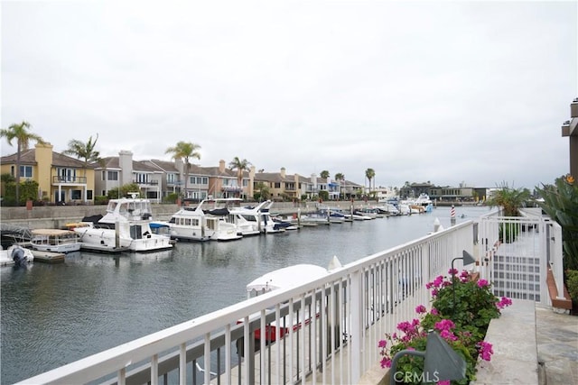 exterior space with a dock and a residential view