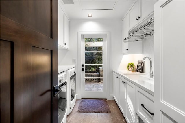 14 Chuckwagon Rd, Rolling Hills, CA 90274 - washroom featuring a sink, separate washer and dryer, and cabinet space