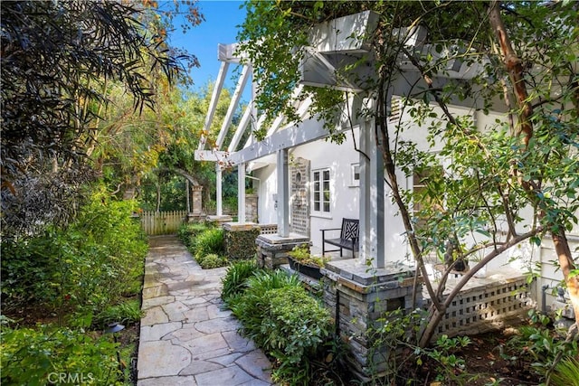 14 Chuckwagon Rd, Rolling Hills, CA 90274 - view of property exterior featuring fence and stucco siding