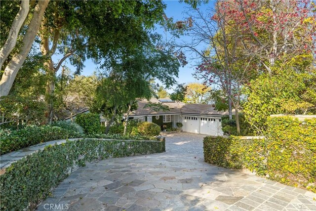 14 Chuckwagon Rd, Rolling Hills, CA 90274 - view of front of property with driveway and a garage