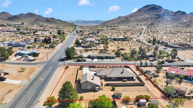 aerial view featuring a mountain view and a residential view