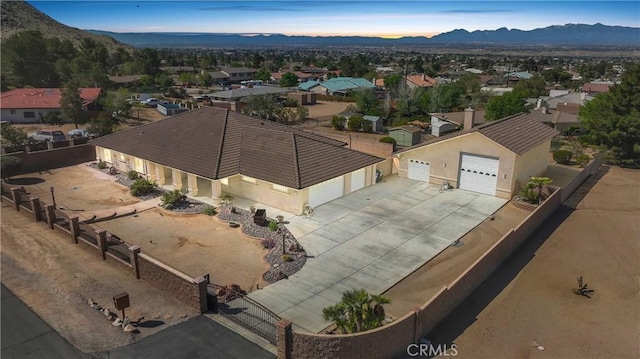 aerial view featuring a mountain view and a residential view