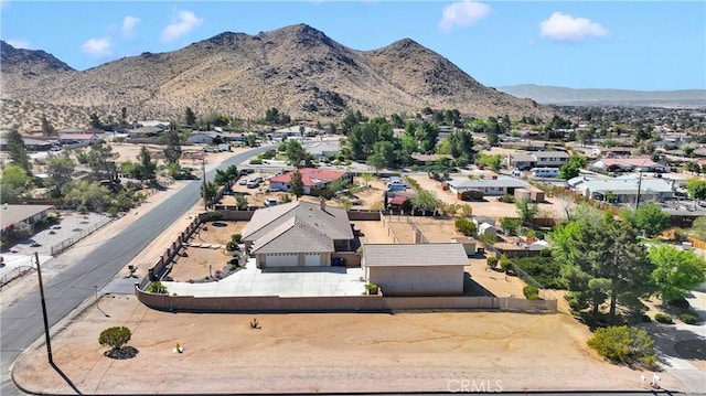 birds eye view of property with a residential view and a mountain view