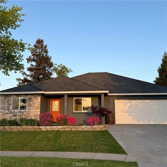single story home featuring concrete driveway, a front lawn, stone siding, a shingled roof, and a garage