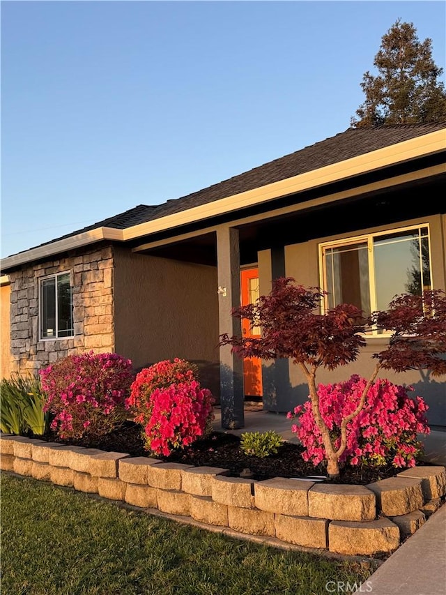 view of property exterior with stucco siding