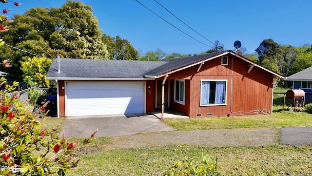 ranch-style home with an attached garage, crawl space, driveway, roof with shingles, and a front yard