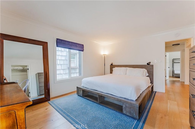 312 36th St, Newport Beach, CA 92663 - bedroom featuring ornamental molding and light wood-style flooring