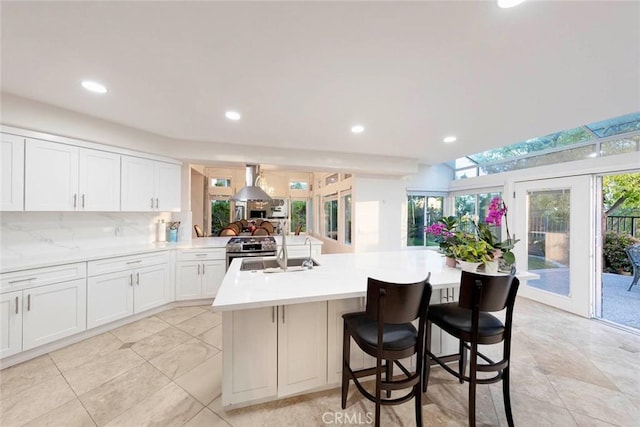 22421 Birchcrest, Mission Viejo, CA 92692 - kitchen with light countertops, a sink, recessed lighting, and white cabinetry