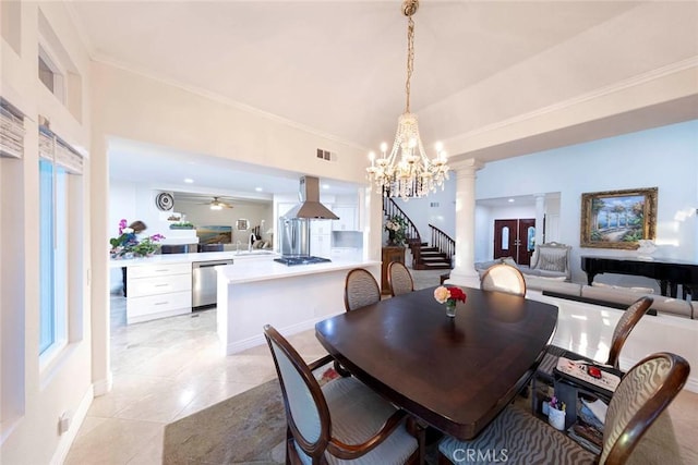 22421 Birchcrest, Mission Viejo, CA 92692 - dining room featuring decorative columns, visible vents, ceiling fan with notable chandelier, stairs, and light tile patterned floors