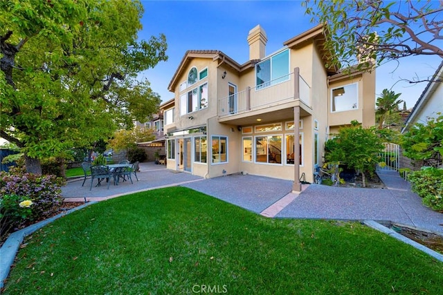 22421 Birchcrest, Mission Viejo, CA 92692 - back of house with a patio area, a balcony, fence, a yard, and stucco siding