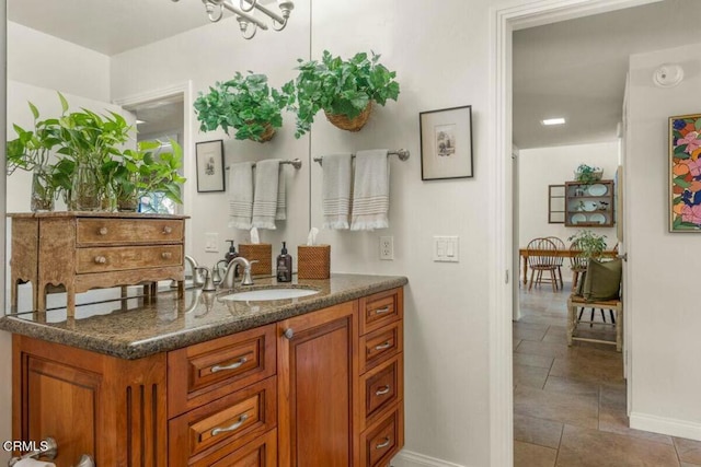 614 Crestview Dr, Ojai, CA 93023 - bathroom with baseboards, vanity, and tile patterned floors