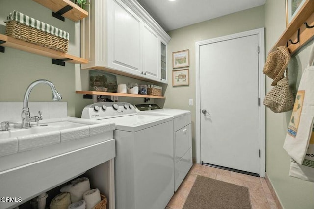 614 Crestview Dr, Ojai, CA 93023 - laundry area with washing machine and dryer, cabinet space, and baseboards