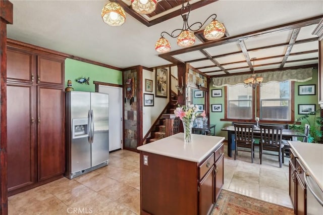 33228 Romance Pl, Temecula, CA 92592 - kitchen featuring light countertops, appliances with stainless steel finishes, a center island, and an inviting chandelier