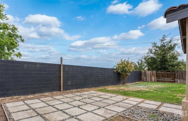view of patio featuring a fenced backyard