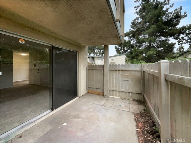 view of patio with fence