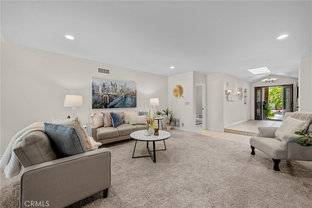 living area featuring light carpet, baseboards, visible vents, and recessed lighting