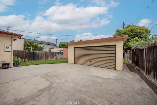 detached garage with fence