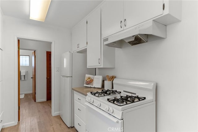 kitchen featuring white cabinets, white gas stove, light wood-style floors, light countertops, and under cabinet range hood