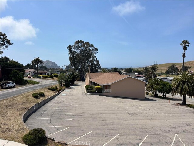 1035 Las Tunas St, Morro Bay, CA 93442 - exterior view of parking and a mountain backdrop