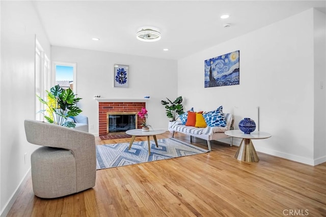 1521 249th St, Harbor City, CA 90710 - living area with wood finished floors, baseboards, a fireplace, and recessed lighting