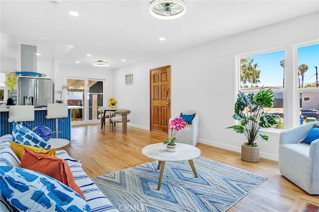 1521 249th St, Harbor City, CA 90710 - living room featuring recessed lighting, light wood finished floors, and baseboards
