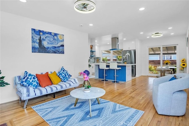 1521 249th St, Harbor City, CA 90710 - living room featuring light wood-type flooring and recessed lighting