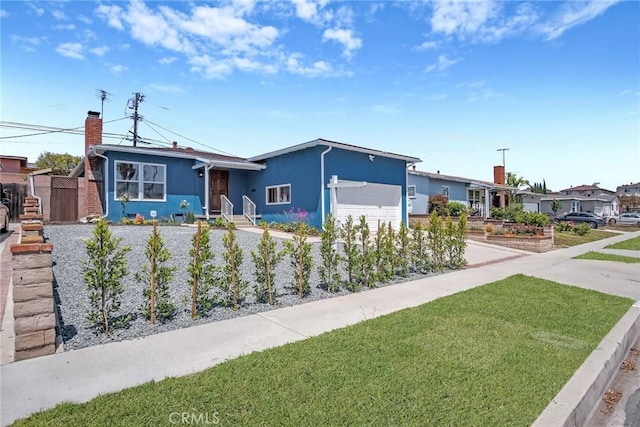 1521 249th St, Harbor City, CA 90710 - view of front of property with stucco siding, a garage, concrete driveway, and a chimney