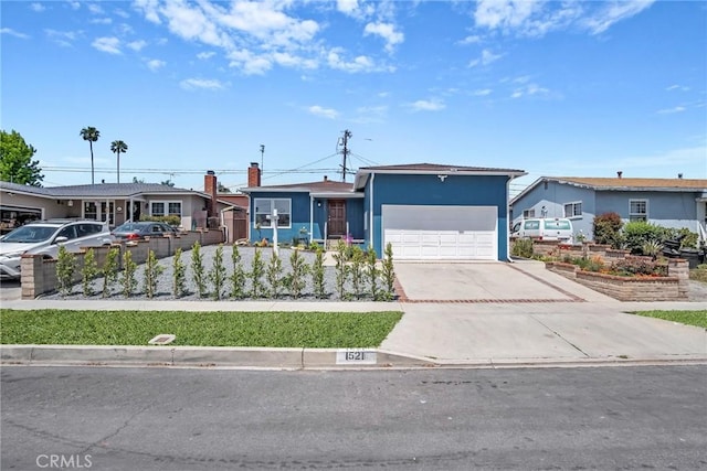 1521 249th St, Harbor City, CA 90710 - ranch-style home featuring concrete driveway, an attached garage, and stucco siding