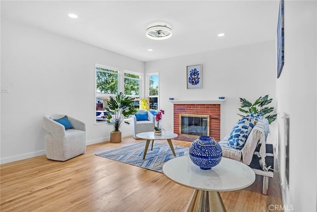 1521 249th St, Harbor City, CA 90710 - living room featuring a brick fireplace, baseboards, wood finished floors, and recessed lighting