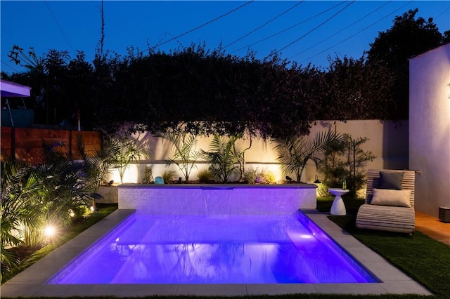 view of swimming pool featuring a fenced backyard and a fenced in pool