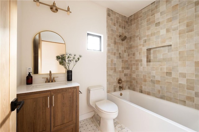 bathroom with shower / washtub combination, vanity, and toilet
