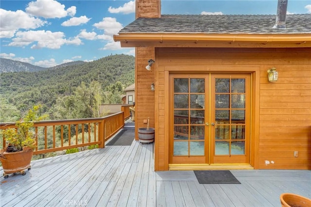 2116 Ironwood Ct, Pine Mountain Club, CA 93222 - wooden deck with a view of trees, french doors, and a mountain view