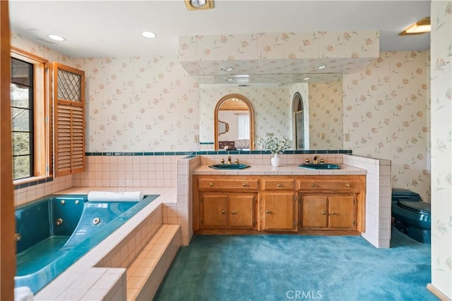 2116 Ironwood Ct, Pine Mountain Club, CA 93222 - bathroom with wallpapered walls, a whirlpool tub, double vanity, and toilet
