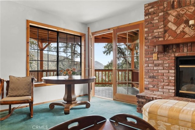 2116 Ironwood Ct, Pine Mountain Club, CA 93222 - living area featuring a brick fireplace and carpet flooring