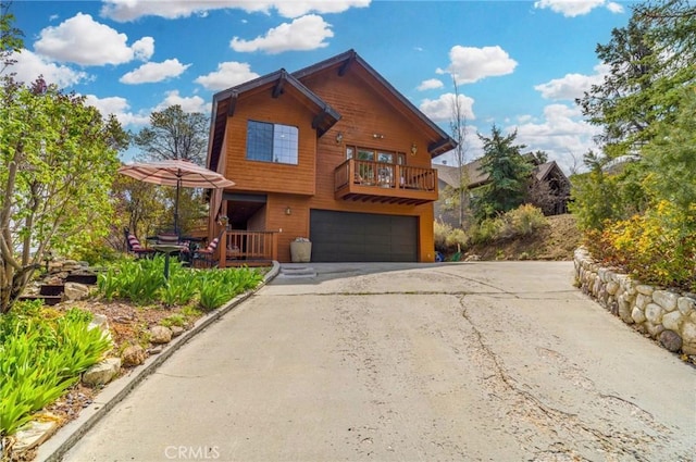 2116 Ironwood Ct, Pine Mountain Club, CA 93222 - view of front facade with driveway and a garage
