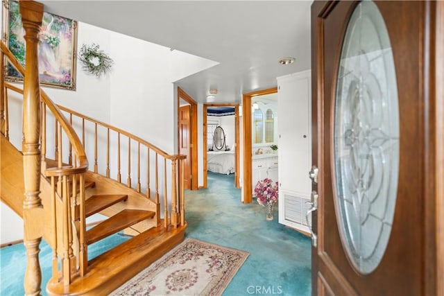 2116 Ironwood Ct, Pine Mountain Club, CA 93222 - carpeted foyer entrance featuring visible vents and stairway