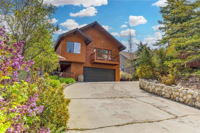2116 Ironwood Ct, Pine Mountain Club, CA 93222 - rustic home with a garage and concrete driveway