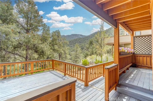 2116 Ironwood Ct, Pine Mountain Club, CA 93222 - wooden deck featuring a mountain view and a wooded view