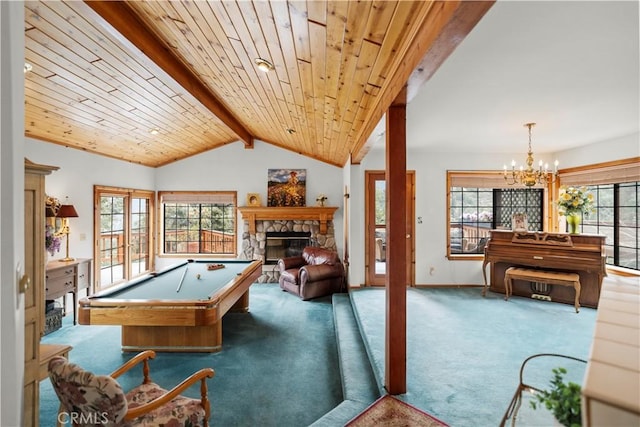 2116 Ironwood Ct, Pine Mountain Club, CA 93222 - game room featuring billiards, an inviting chandelier, a stone fireplace, vaulted ceiling with beams, and carpet floors