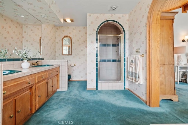 2116 Ironwood Ct, Pine Mountain Club, CA 93222 - full bathroom with a shower stall, baseboards, vanity, and wallpapered walls
