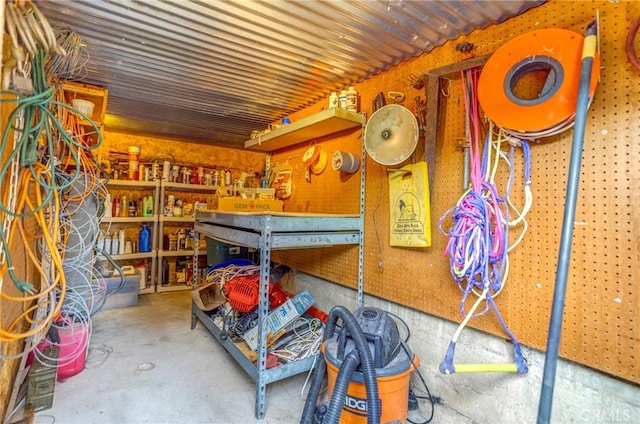 2116 Ironwood Ct, Pine Mountain Club, CA 93222 - bedroom with a workshop area and unfinished concrete flooring