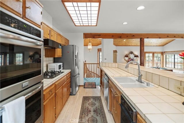 2116 Ironwood Ct, Pine Mountain Club, CA 93222 - kitchen with tile counters, a sink, recessed lighting, and appliances with stainless steel finishes