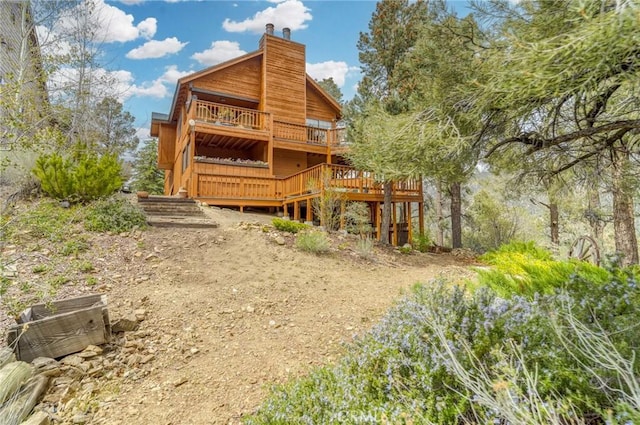 2116 Ironwood Ct, Pine Mountain Club, CA 93222 - back of property featuring a chimney and a deck