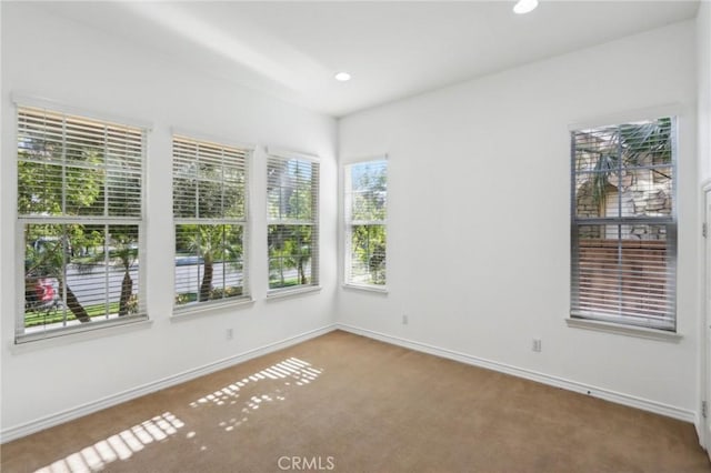 15688 Portenza Dr, Fontana, CA 92336 - carpeted spare room featuring baseboards and recessed lighting