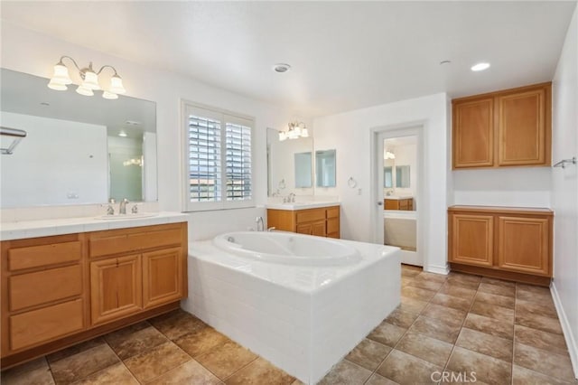 15688 Portenza Dr, Fontana, CA 92336 - bathroom featuring a garden tub and two vanities