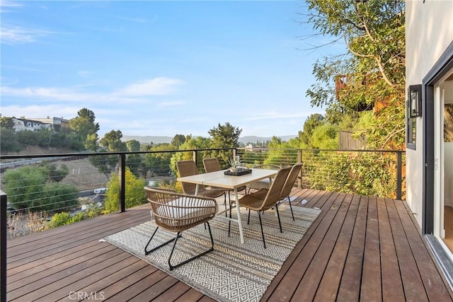 deck featuring outdoor dining space