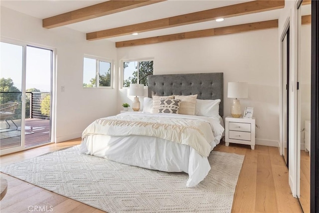 bedroom with light wood-type flooring, beamed ceiling, baseboards, access to exterior, and recessed lighting