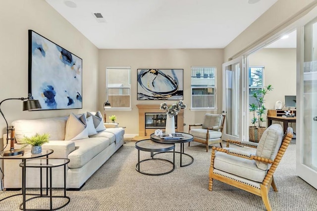 10495 Abalone Lndg, San Diego, CA 92130 - living area featuring plenty of natural light, carpet, and baseboards