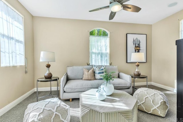 10495 Abalone Lndg, San Diego, CA 92130 - carpeted living room featuring baseboards and ceiling fan